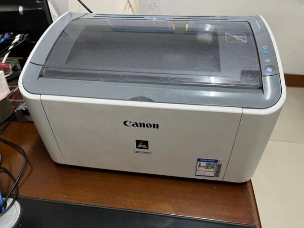 佳能2900打印机 2900打印机第二张出一半卡住
